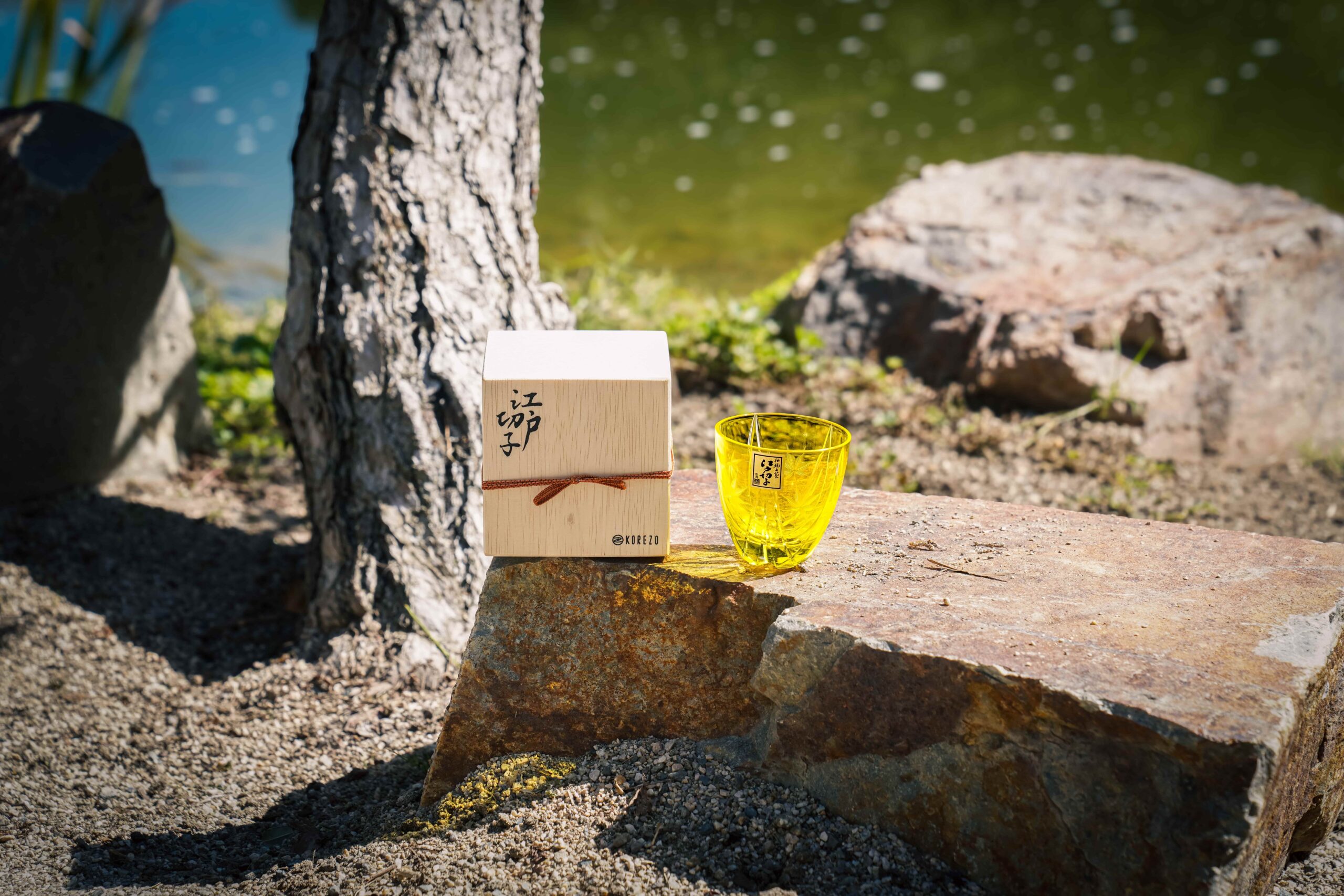 Edo-kiriko" Japanese maple" on the stone at the Zen garden by the lake